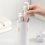 TravelFlow™ 4-in-1 Portable Travel Dispenser Bottle